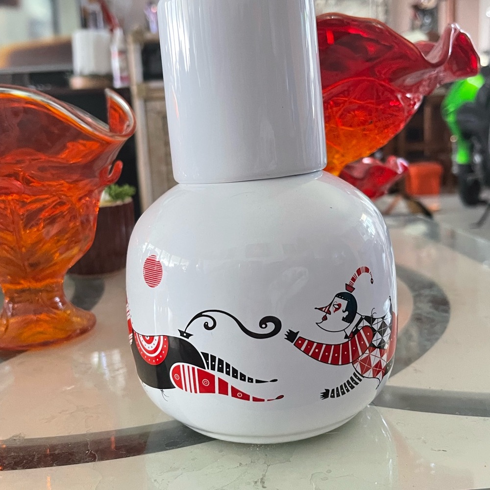 Whimsical and fun carafe.